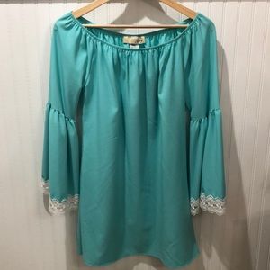 Beautiful turquoise over the shoulder dress